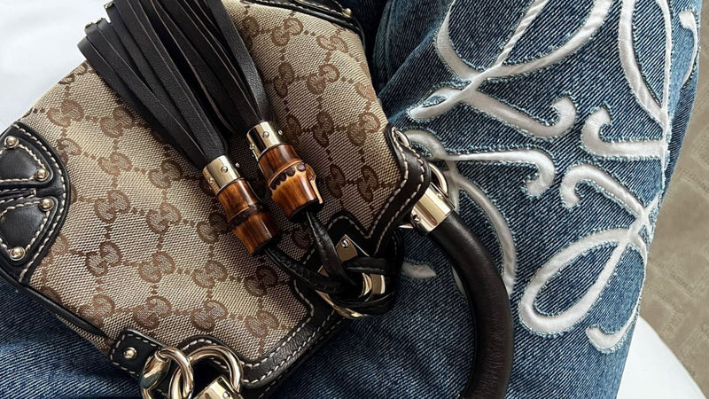 Vintage Gucci Brown Designer Bag and Loewe Jeans.