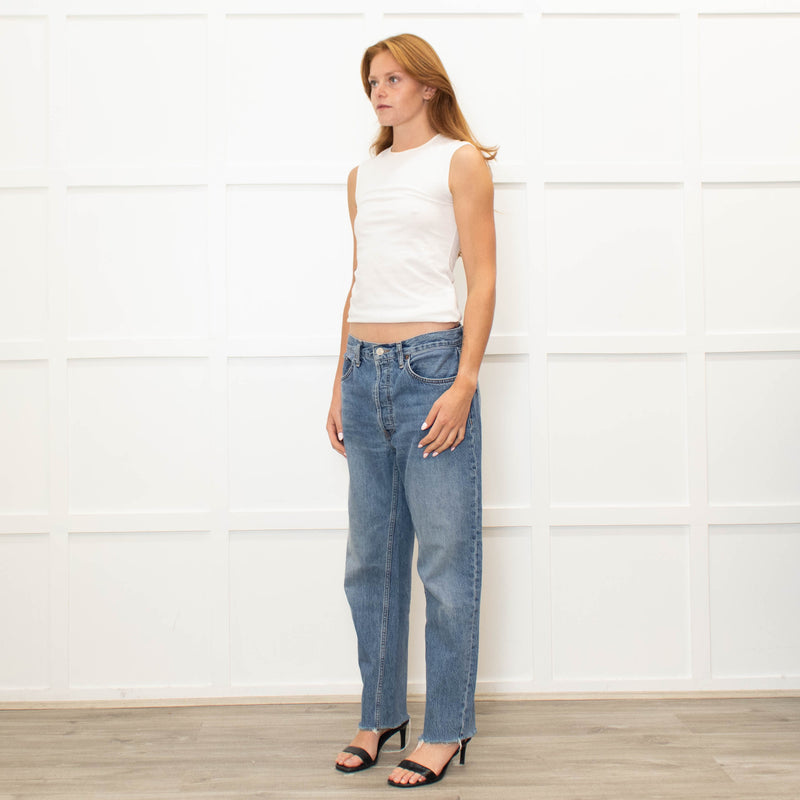 Re/Done Blue Wash Straight Leg Jeans With Distressed Hem