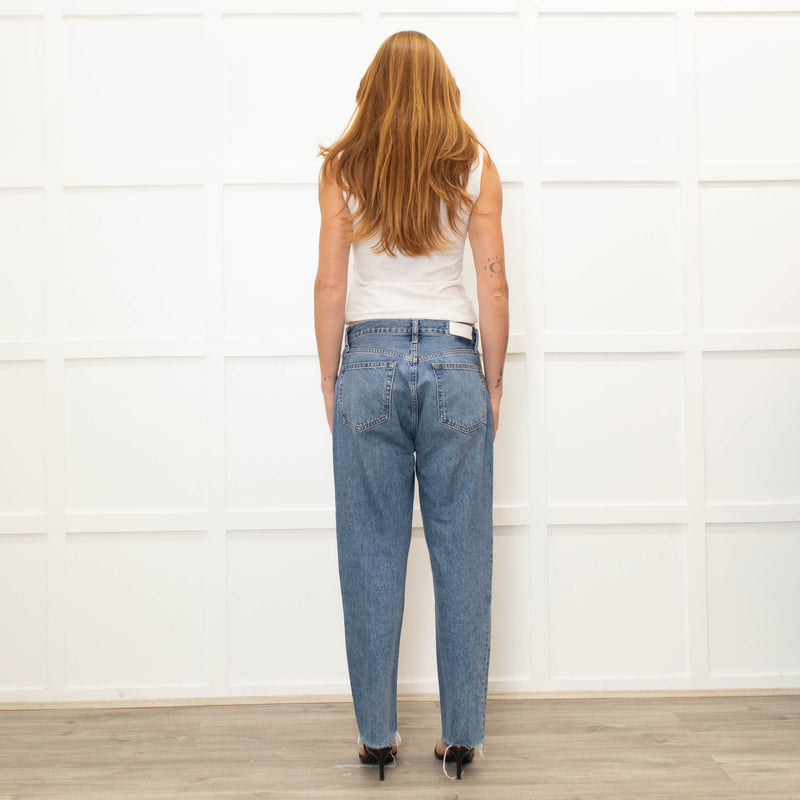 Re/Done Blue Wash Straight Leg Jeans With Distressed Hem