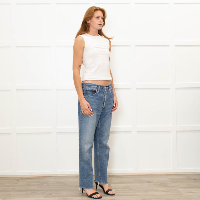 Re/Done Blue Wash Straight Leg Jeans With Distressed Hem