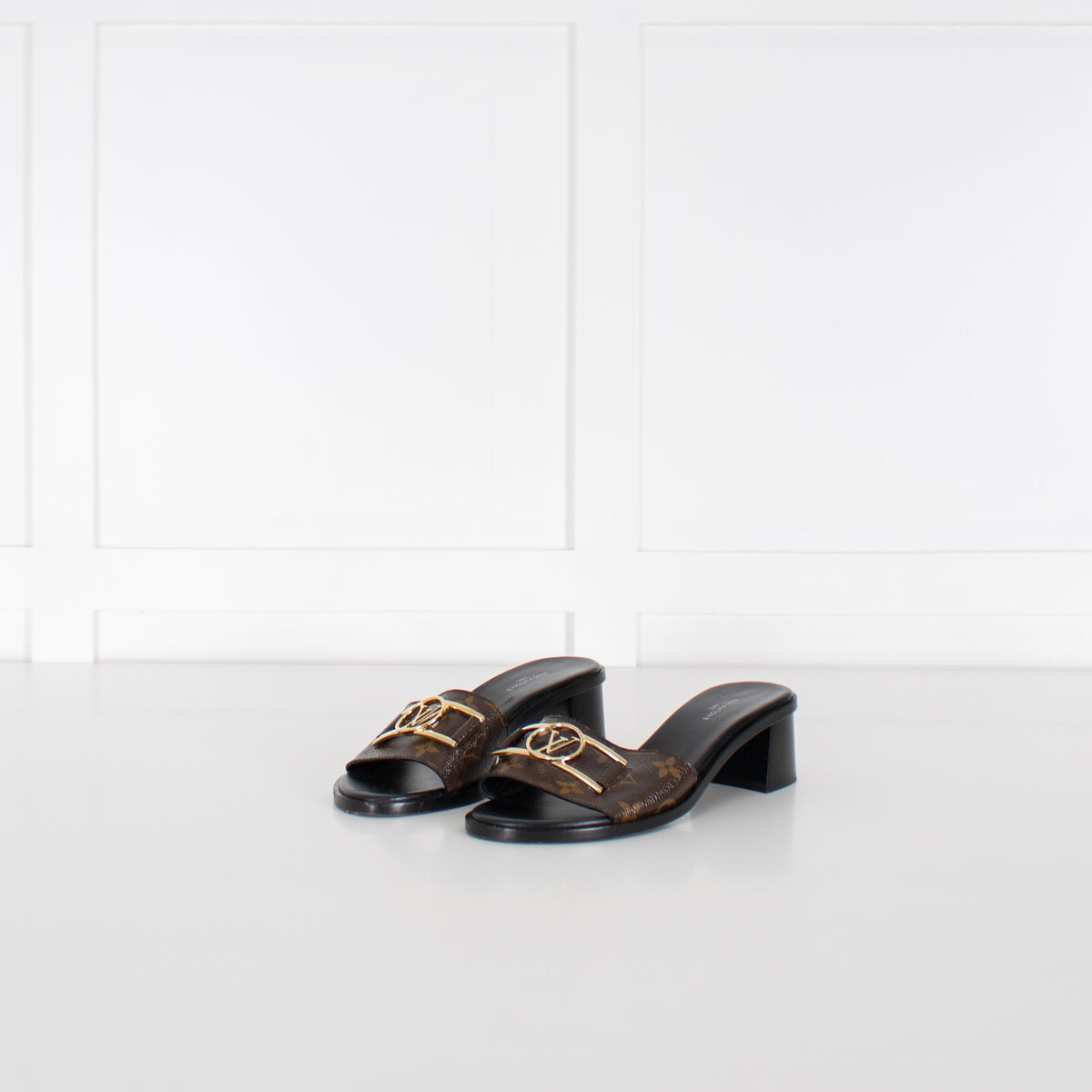 Louis Vuitton Brown Monogram Lock It Heeled Mules