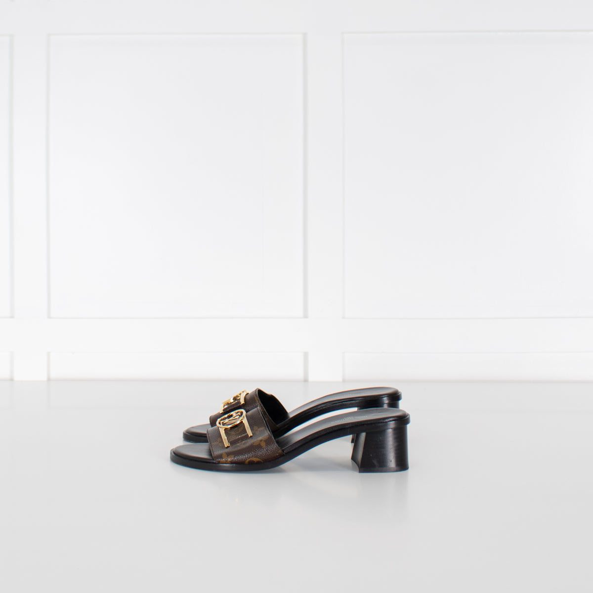 Louis Vuitton Brown Monogram Lock It Heeled Mules