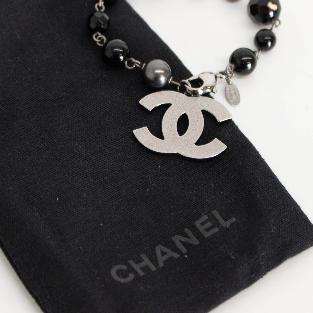 Chanel Black Faux Pearl Silver Tone CC Bracelet