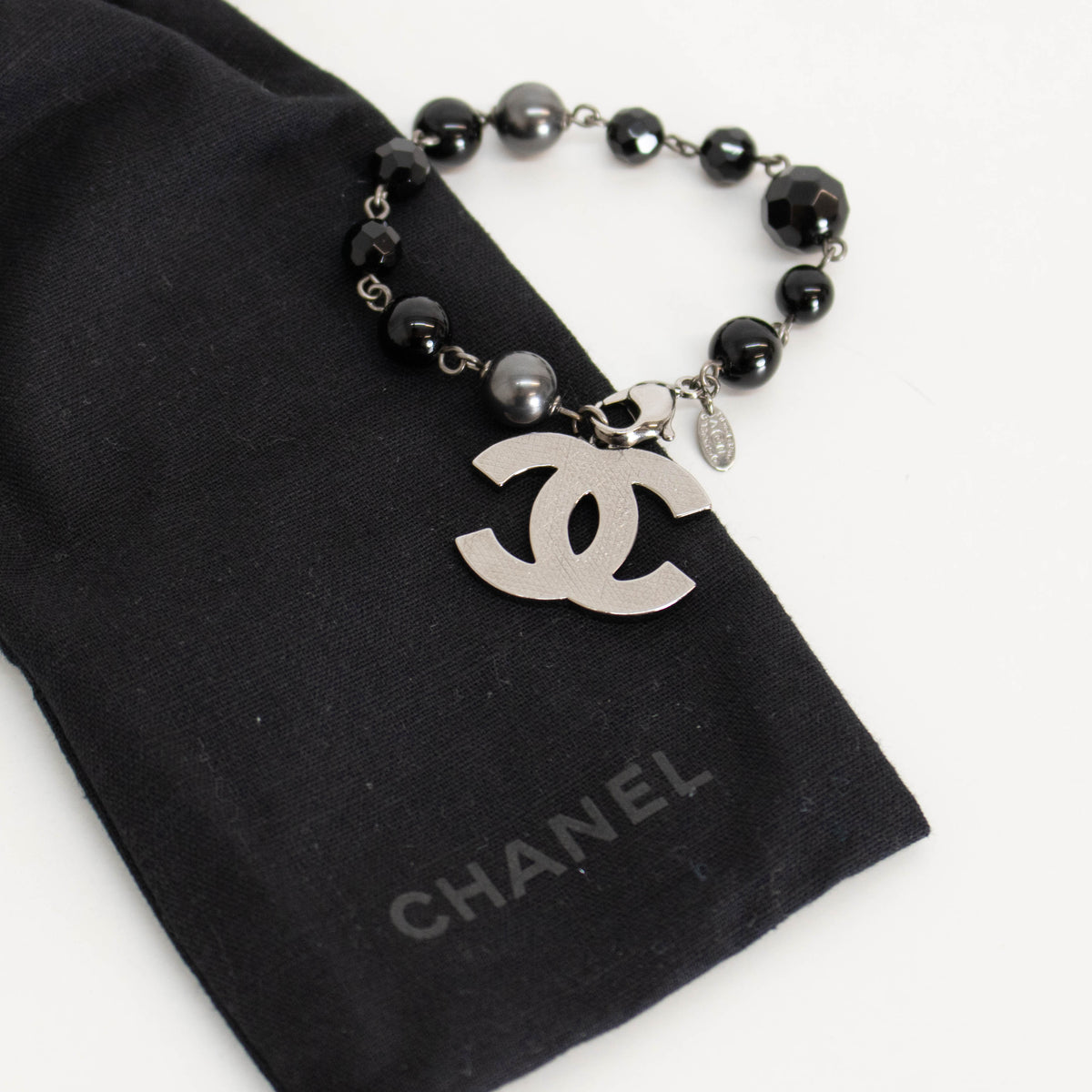 Chanel Black Faux Pearl Silver Tone CC Bracelet