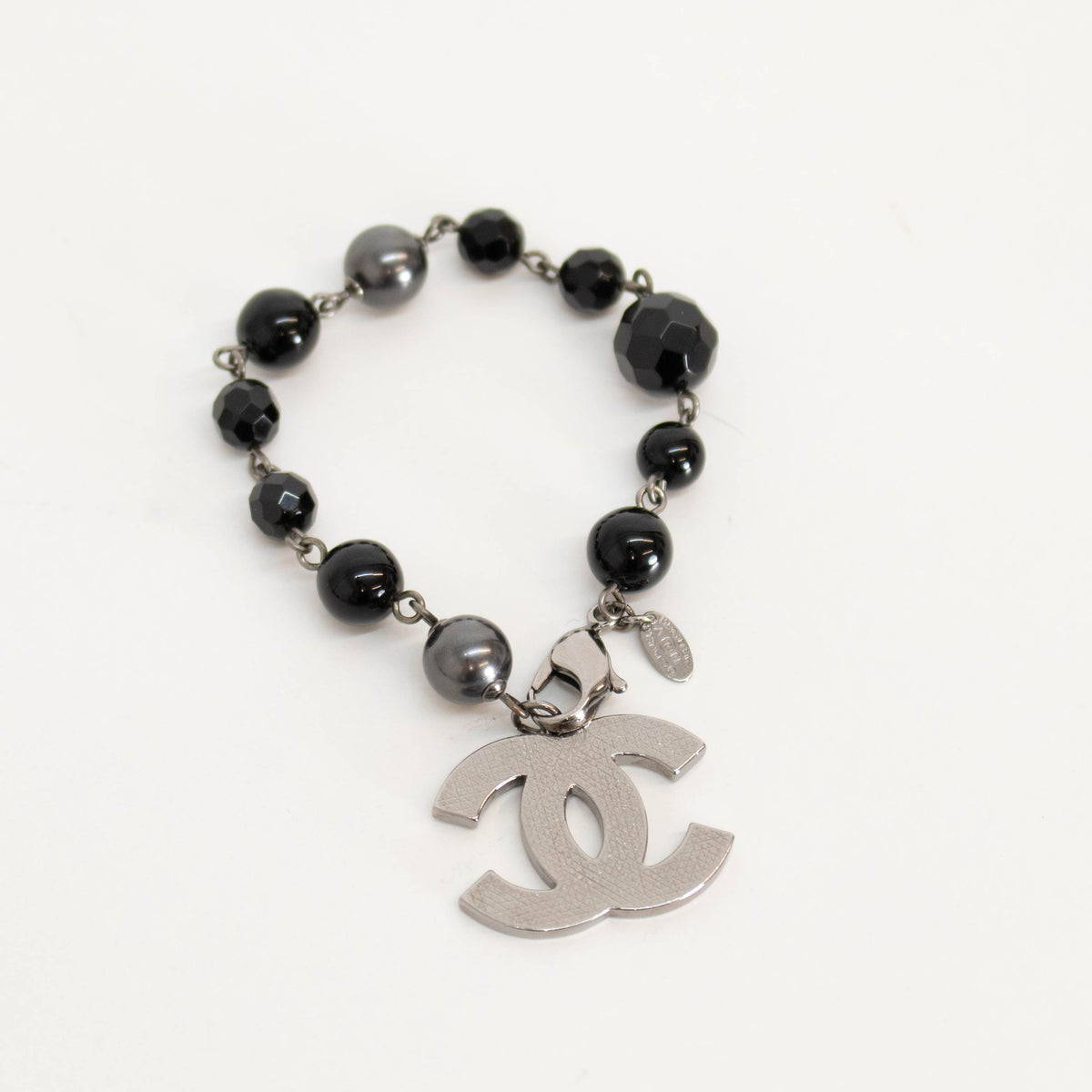 Chanel Black Faux Pearl Silver Tone CC Bracelet