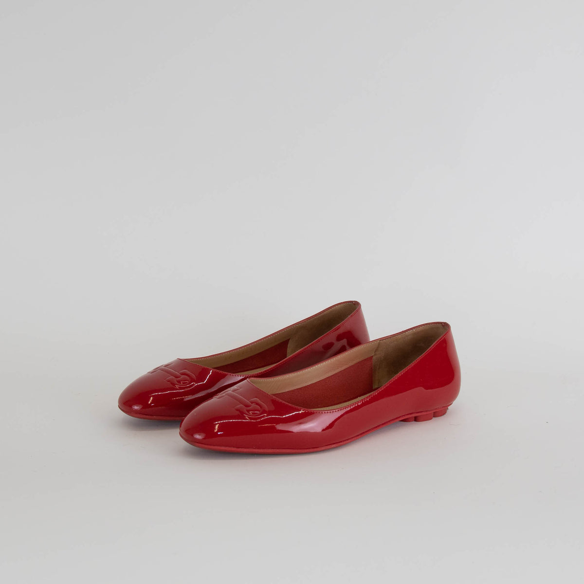 Salvatore Ferragamo Red Patent Horse Bit Embossed Flat Pumps