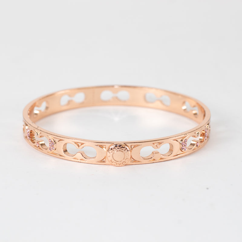 Coach Rose Gold Kissing C Bangle