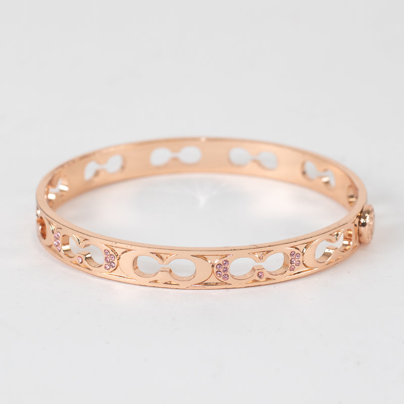 Coach Rose Gold Kissing C Bangle