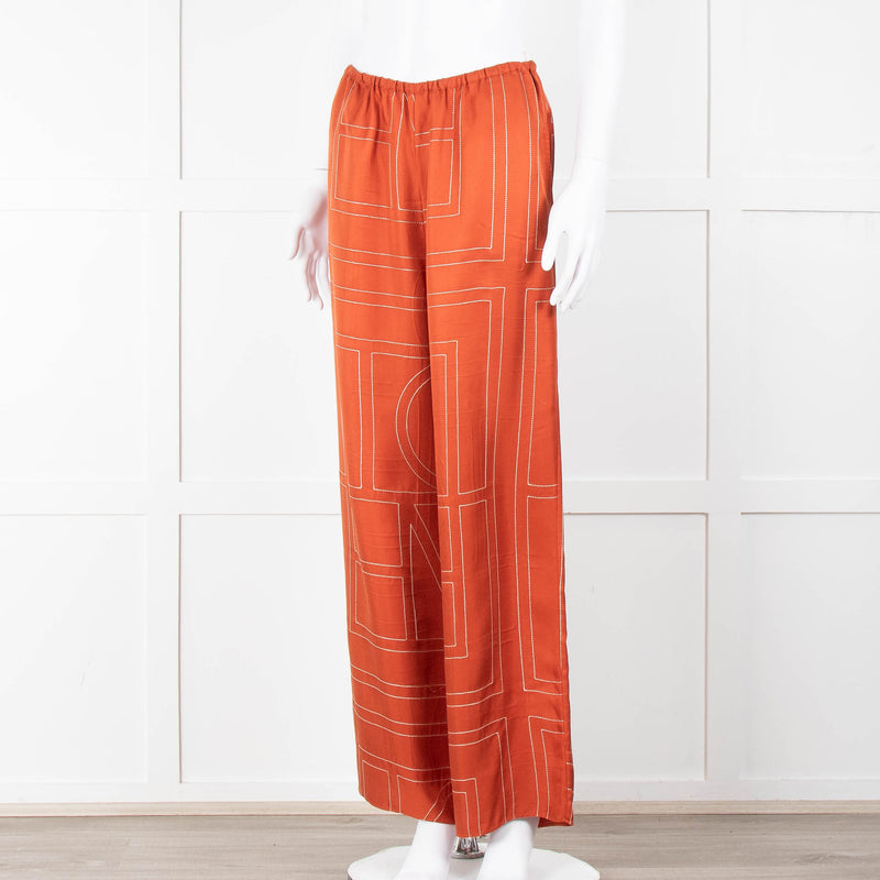 Toteme Orange Silk Logo Embroidered Trousers