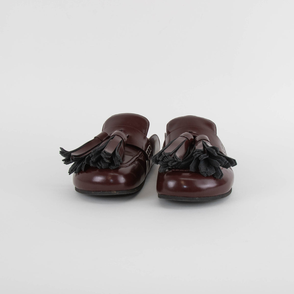 JW Anderson Burgundy Tassel Leather Mules