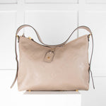 Louis Vuitton Carryall MM in Tourterelle Empreinte Leather