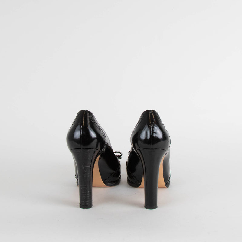 Salvatore Ferragamo Black Patent Heels with Logo Bow