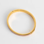 Coach Gold Pink Enamel Bangle