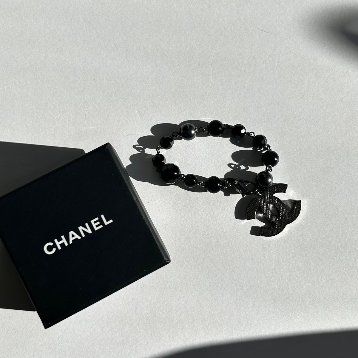 Chanel Black Faux Pearl Silver Tone CC Bracelet