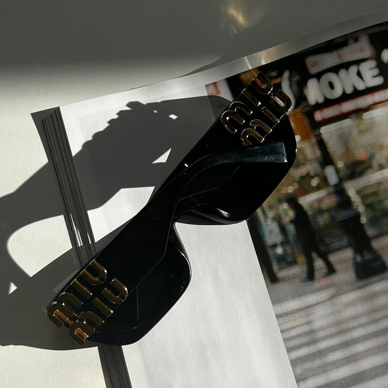 Miu Miu Black Gold Logo Sunglasses