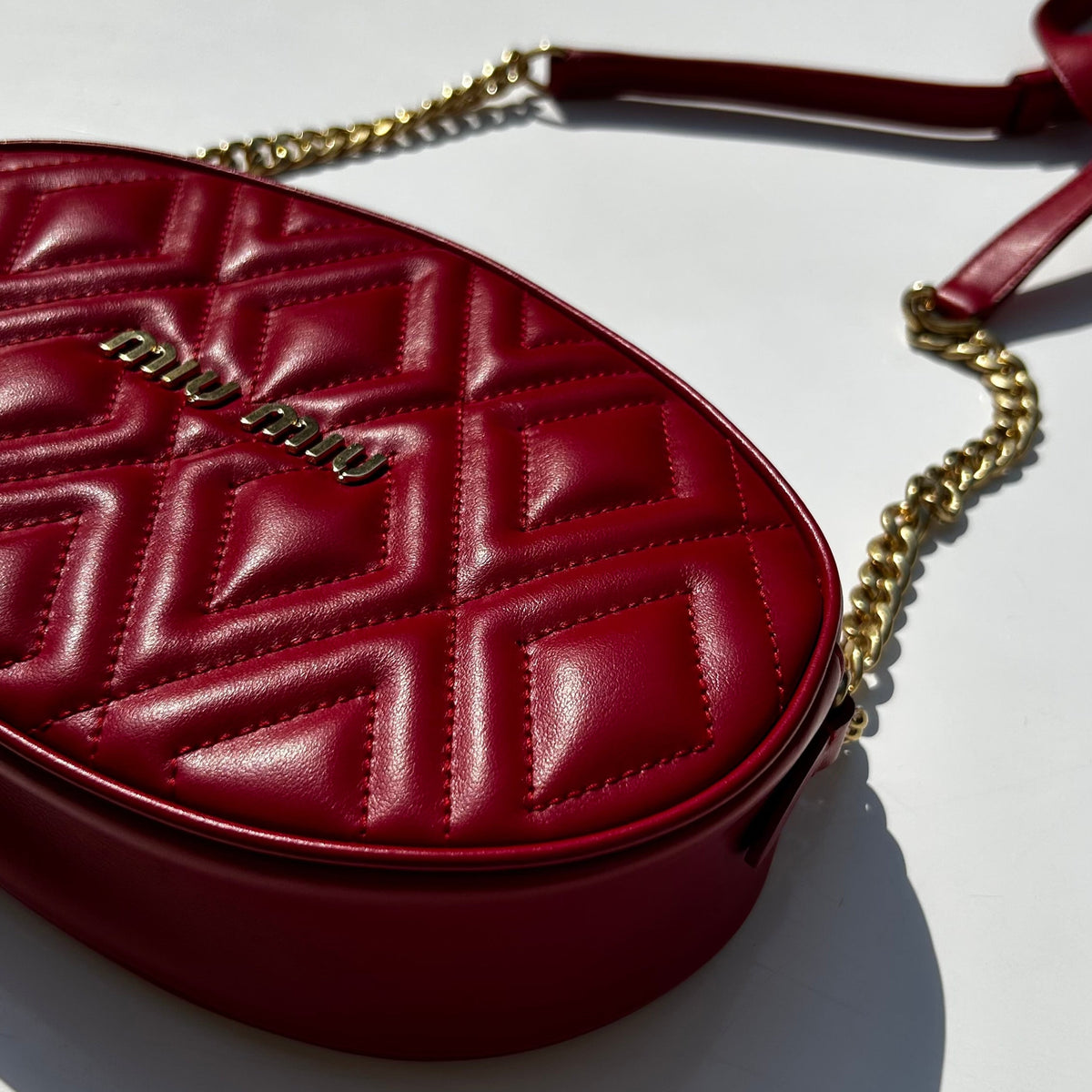 Miu Miu Red Oval Crossbody Quilted Bag