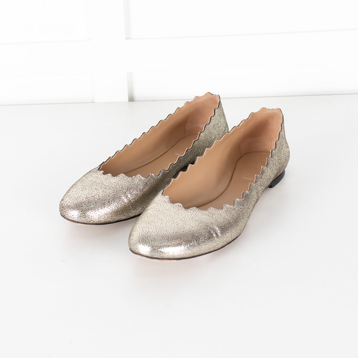 Chloe Distressed Gold Leather Ballerines