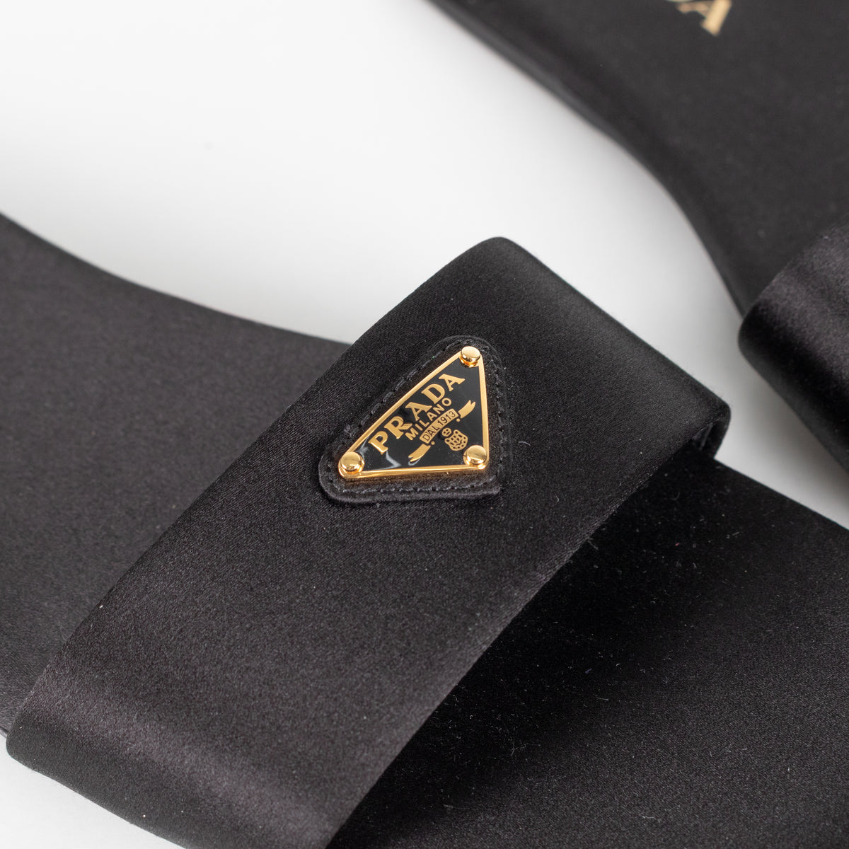 Prada Black Satin Logo Plaque Slip on Sandals