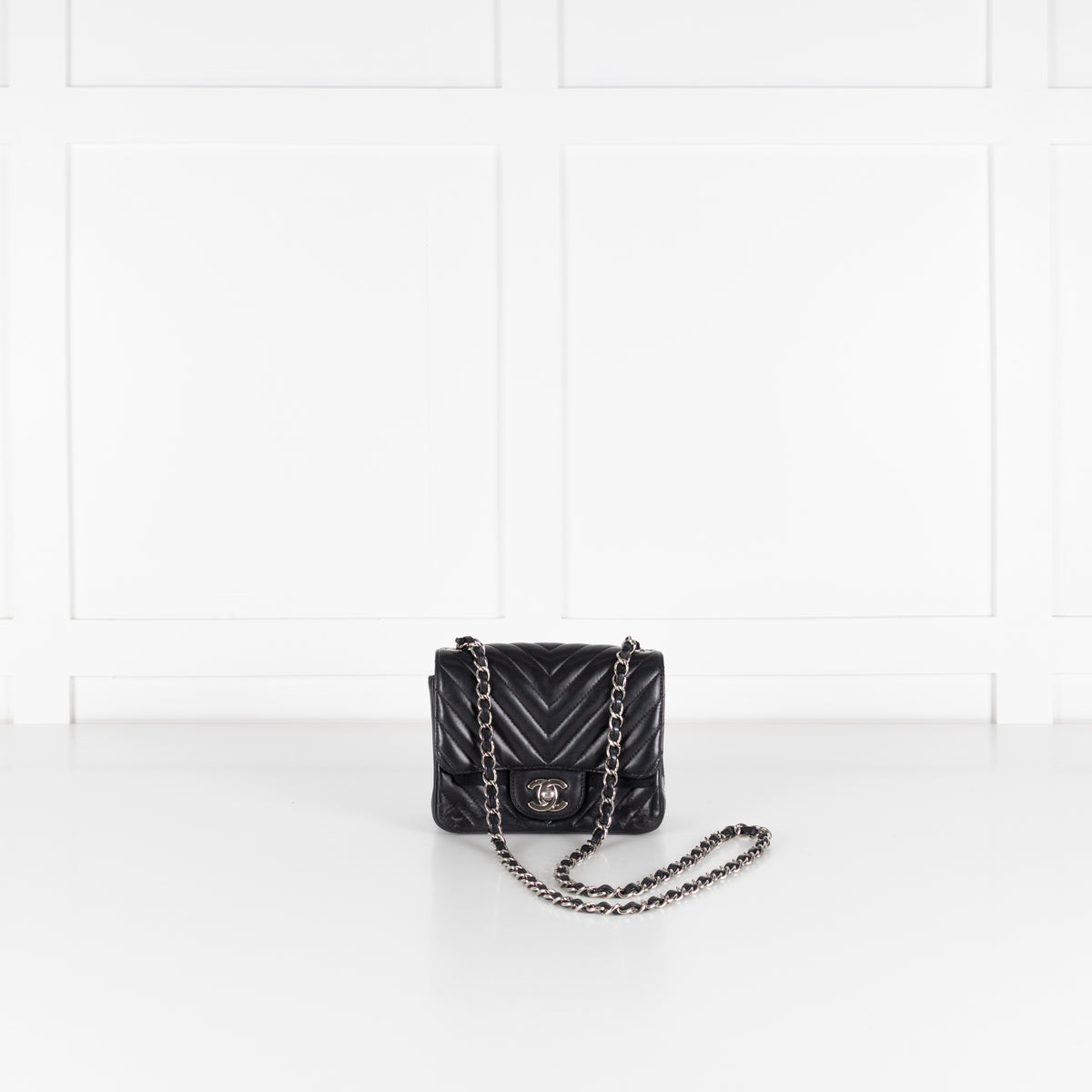 Chanel Black Mini Chevron Flap Bag at Phoenix style shop in cobham.
