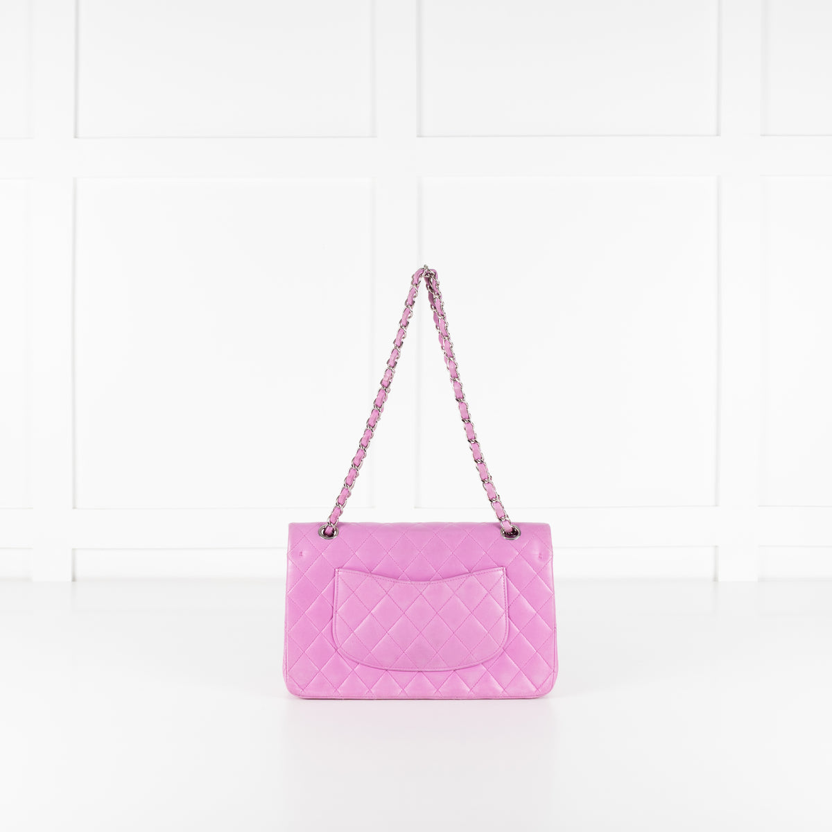 Back image of Chanel Pink Matelasse 25 Lambskin Double Flap Bag on white background.