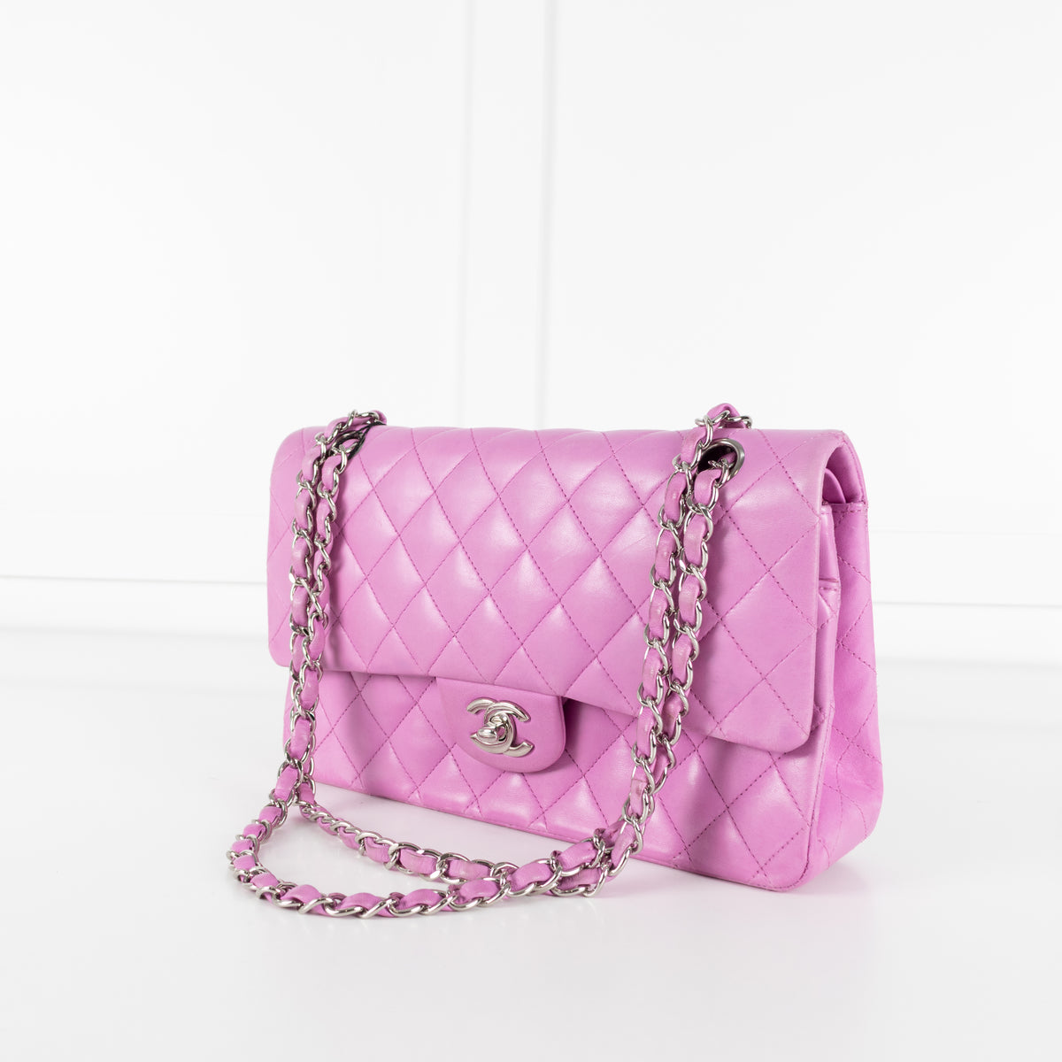 Close up of Chanel Pink Matelasse 25 Lambskin Double Flap Bag.