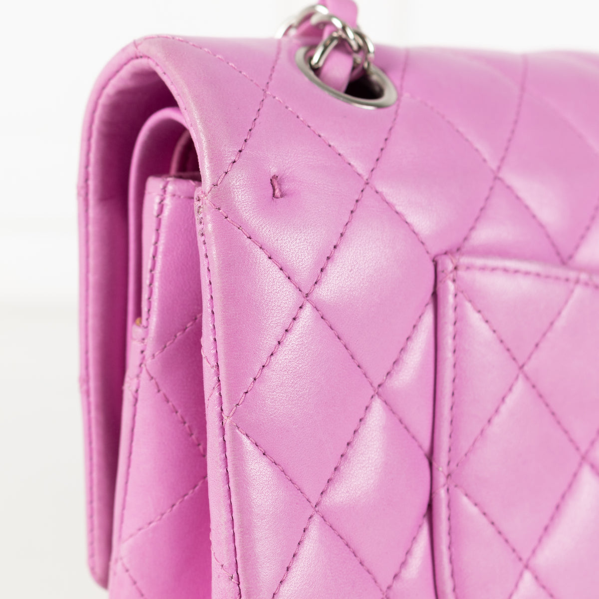 Close up of back of Chanel Pink Matelasse 25 Lambskin Double Flap Bag.