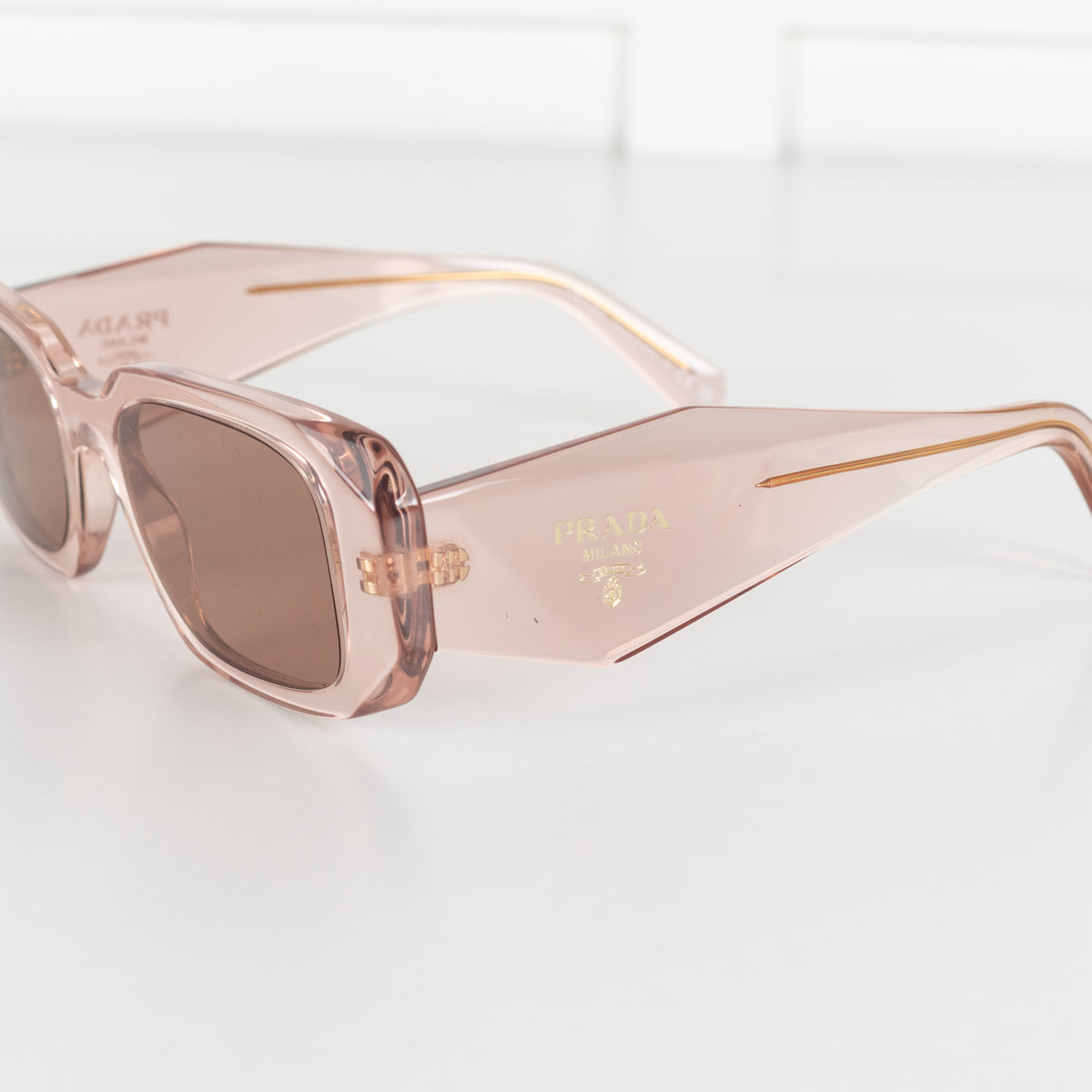 Prada Clear Pink Rectangular Sunglasses
