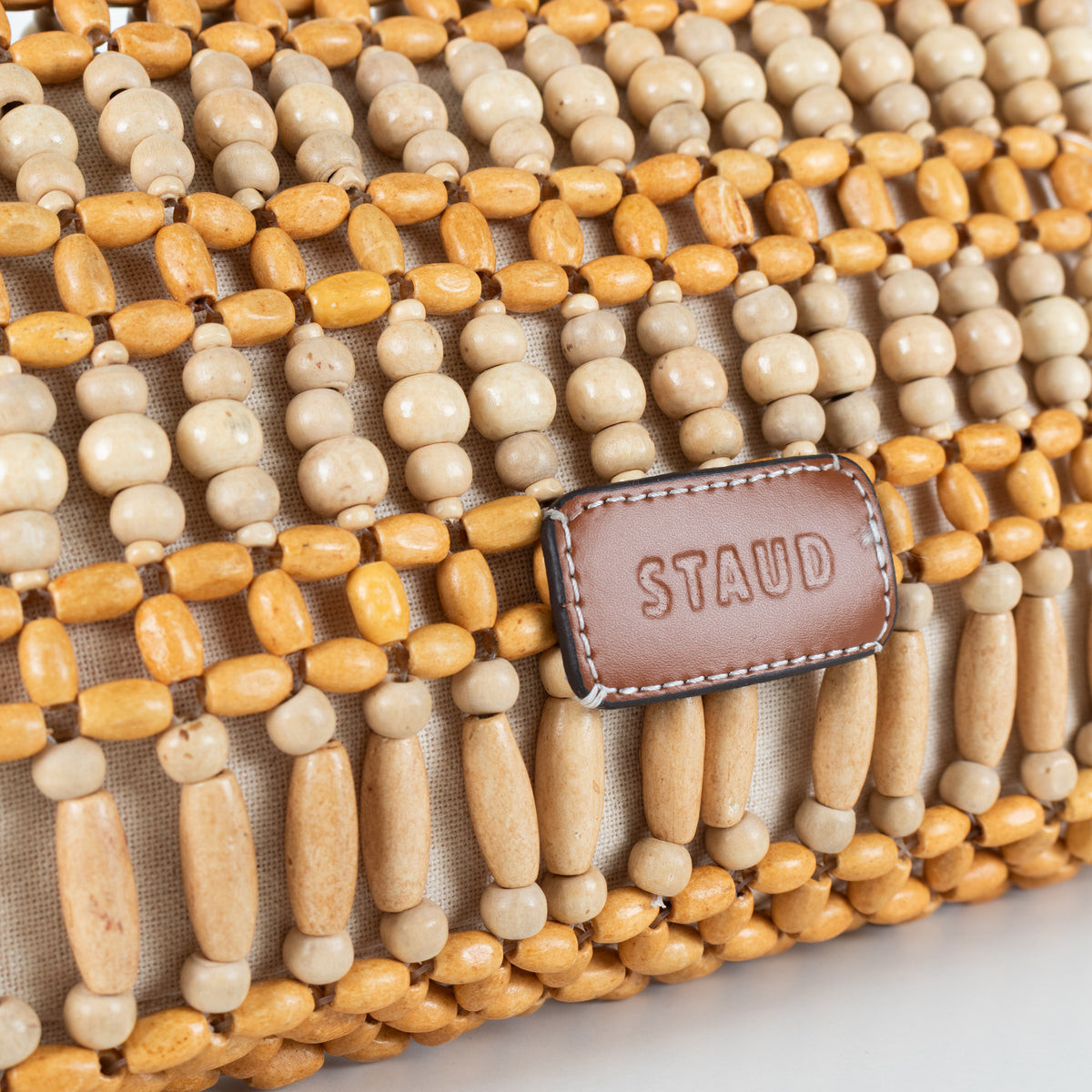 STAUD Timmy Wooden Bead Fold Over Shoulder Bag