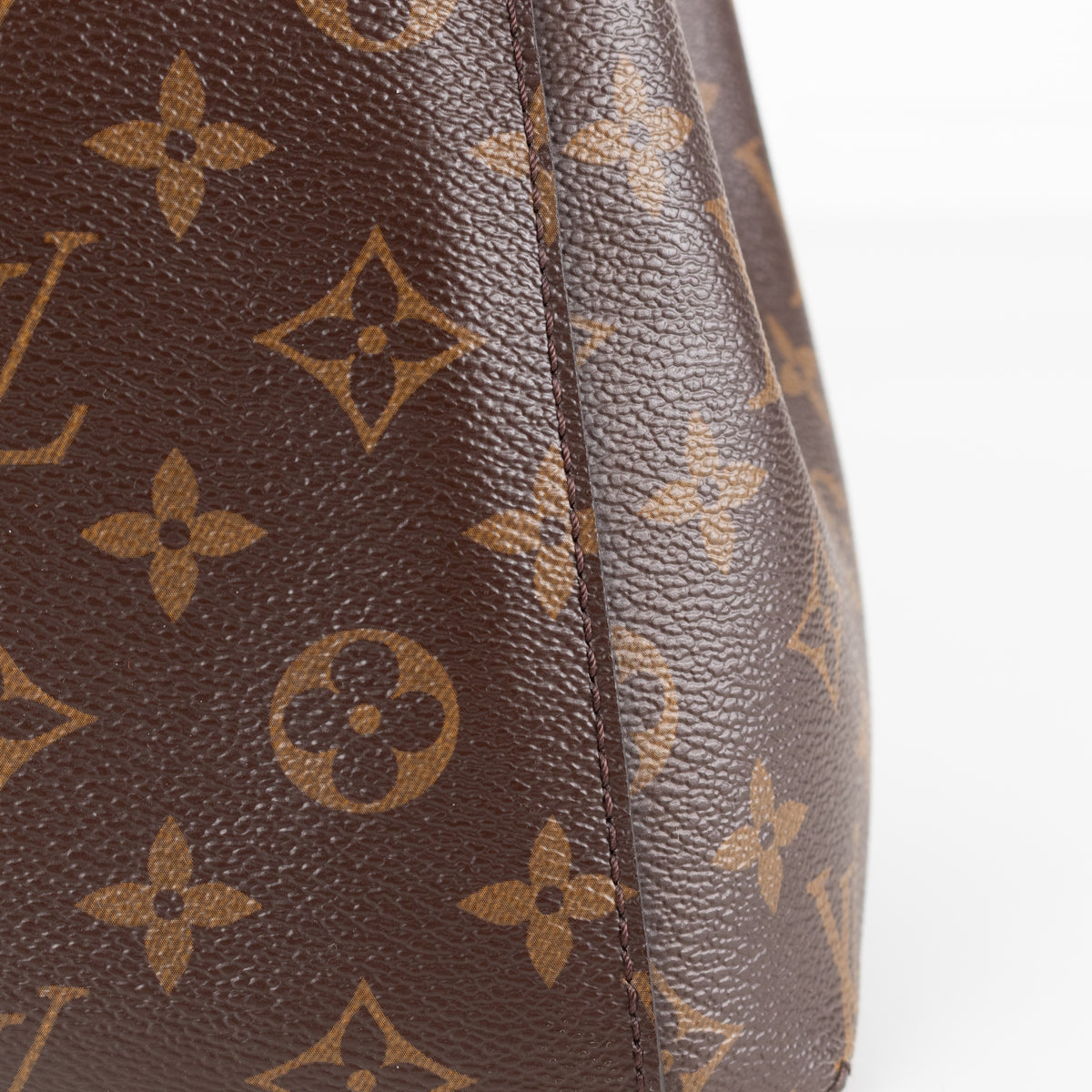 Close up of stitching onLouis Vuitton Monogram Canvas Montaigne MM.