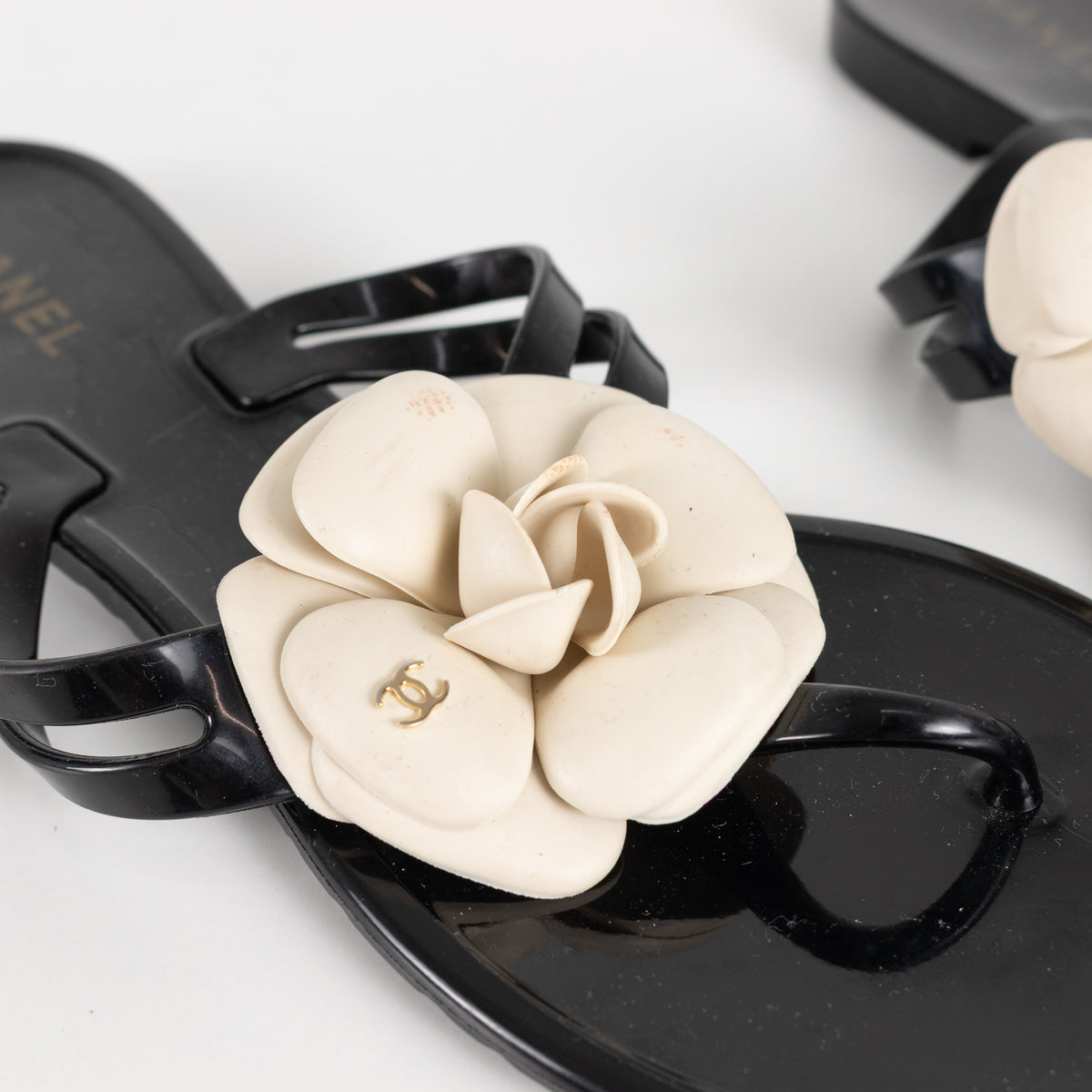 Chanel Black Plastic Camelia Flip Flops