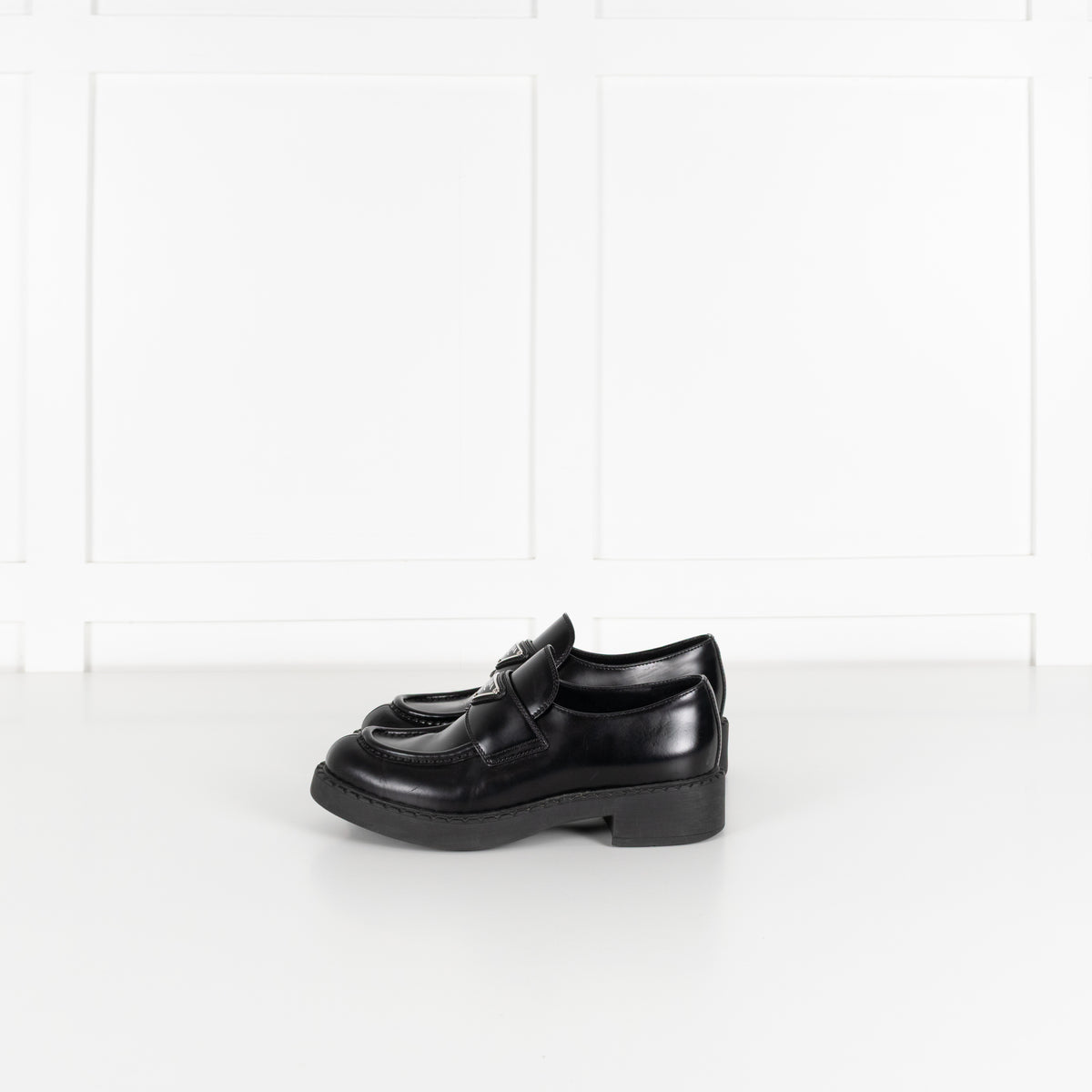 Prada Black Leather Plaque Logo Platform Loafers