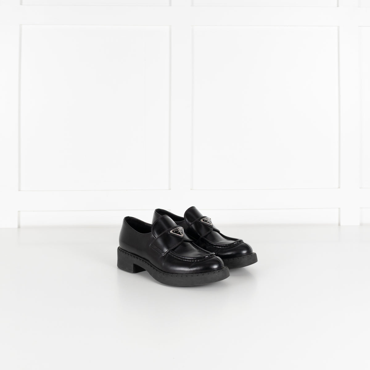 Prada Black Leather Plaque Logo Platform Loafers
