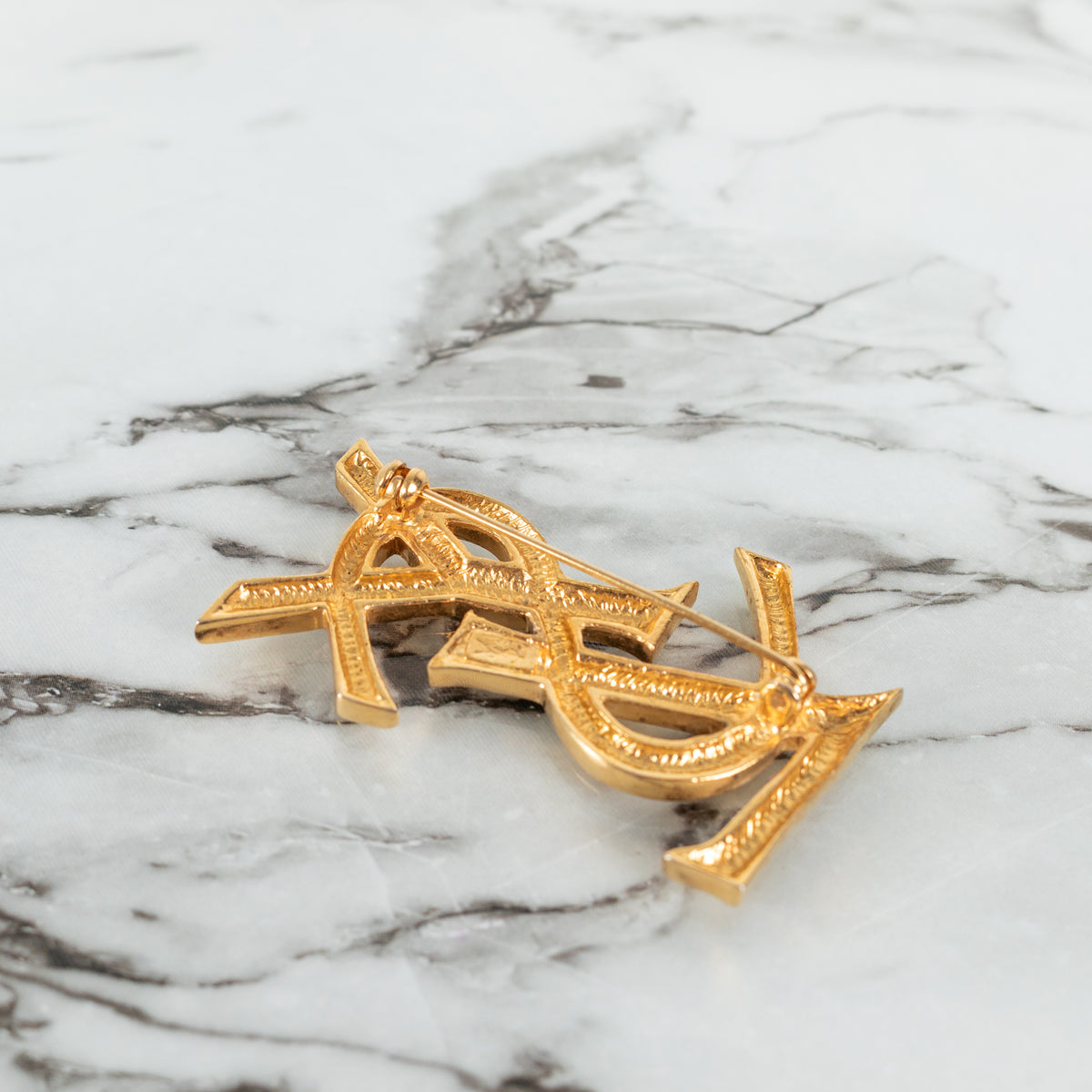 Yves Saint Laurent Gold Tone YSL Brooch