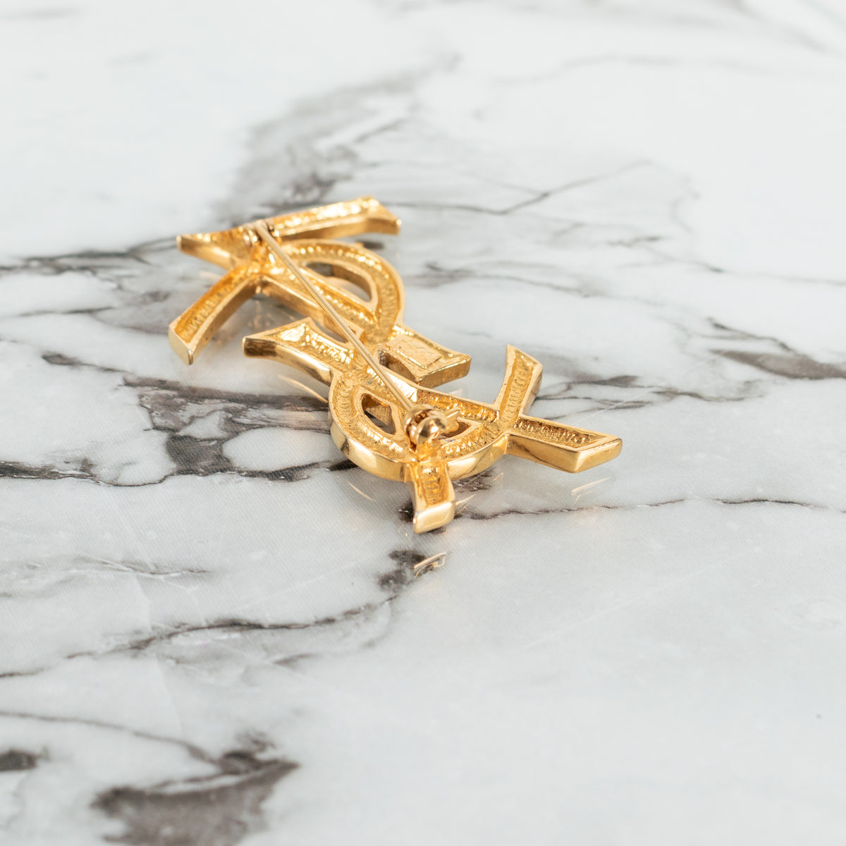 Yves Saint Laurent Gold Tone YSL Brooch