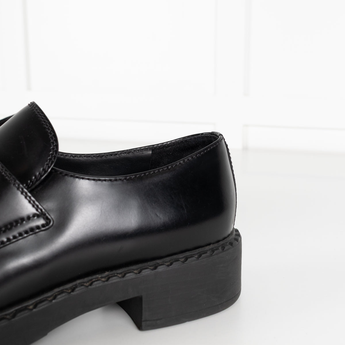 Prada Black Leather Plaque Logo Platform Loafers
