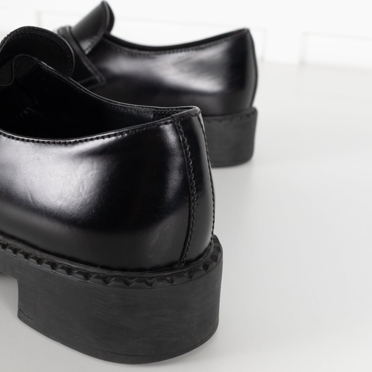 Prada Black Leather Plaque Logo Platform Loafers