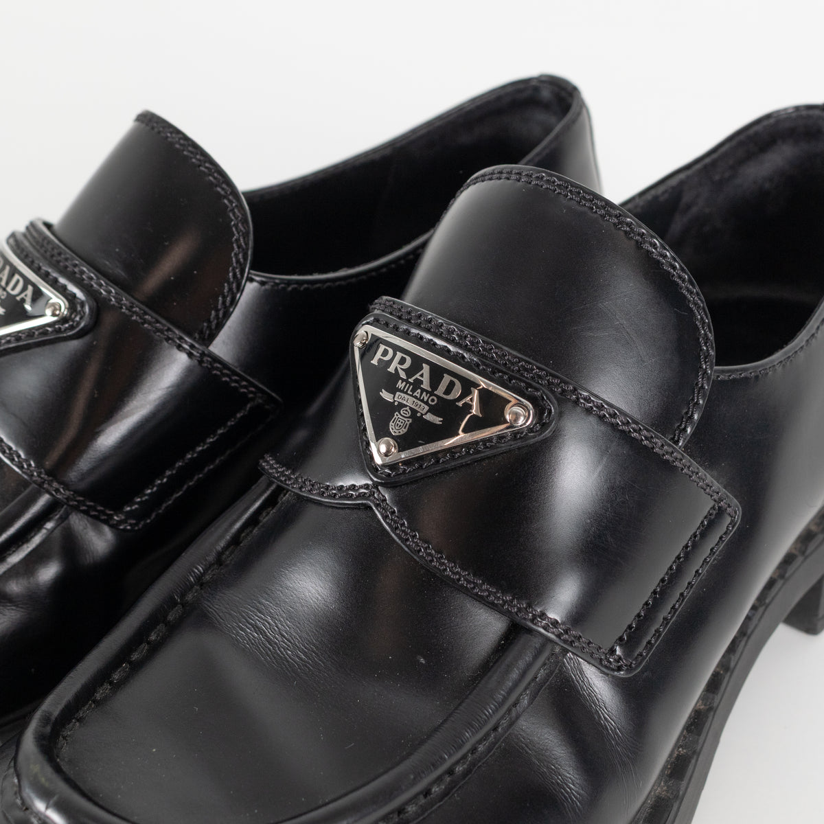 Prada Black Leather Plaque Logo Platform Loafers