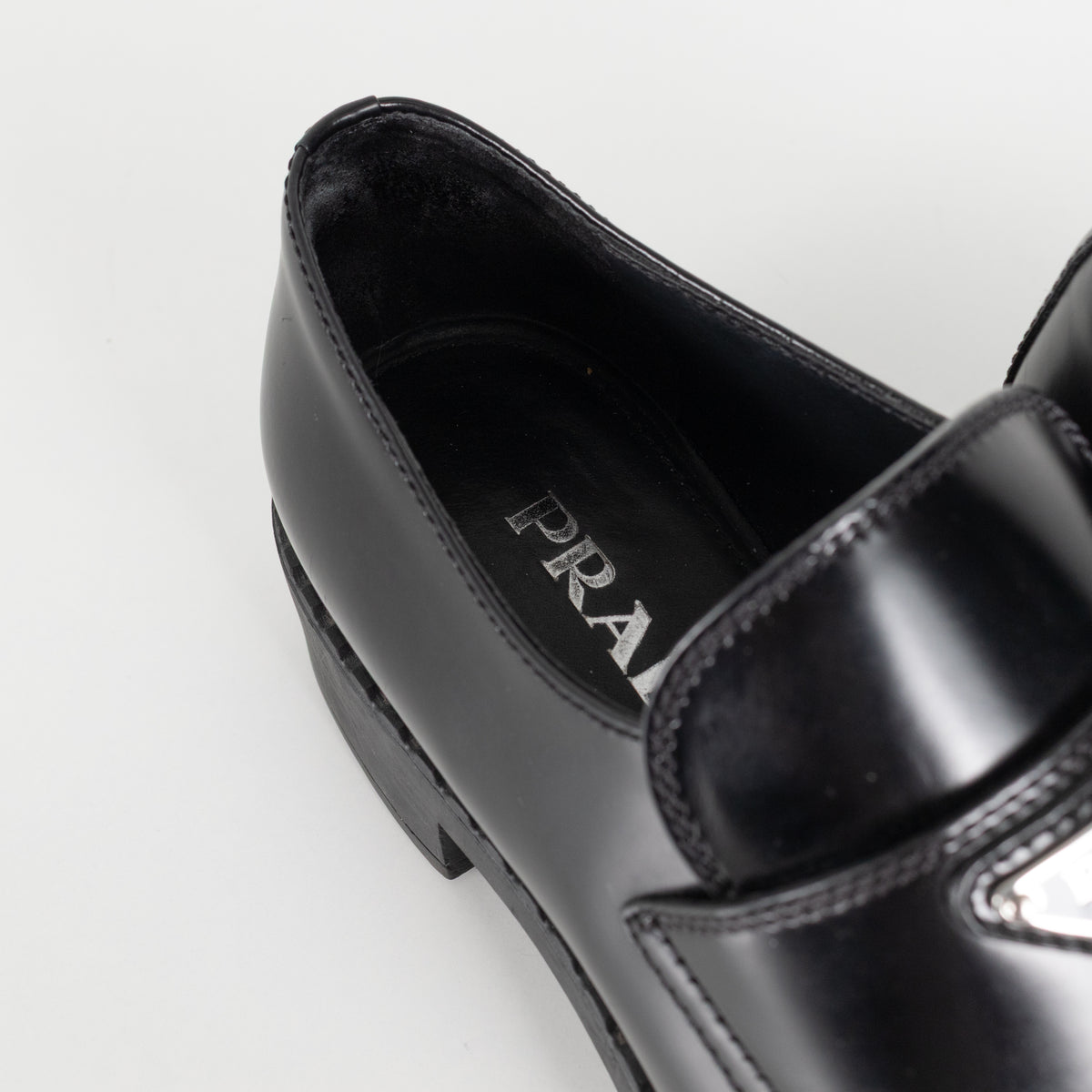 Prada Black Leather Plaque Logo Platform Loafers