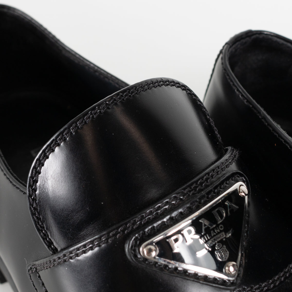 Prada Black Leather Plaque Logo Platform Loafers