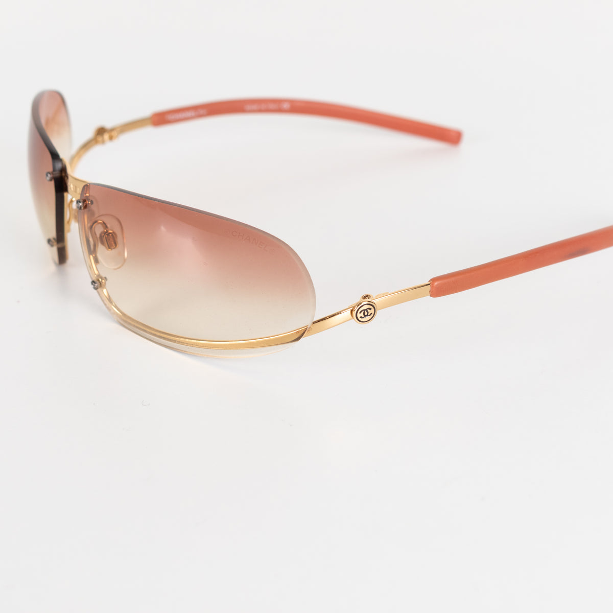 Chanel Orange Tone Frameless Sunglasses
