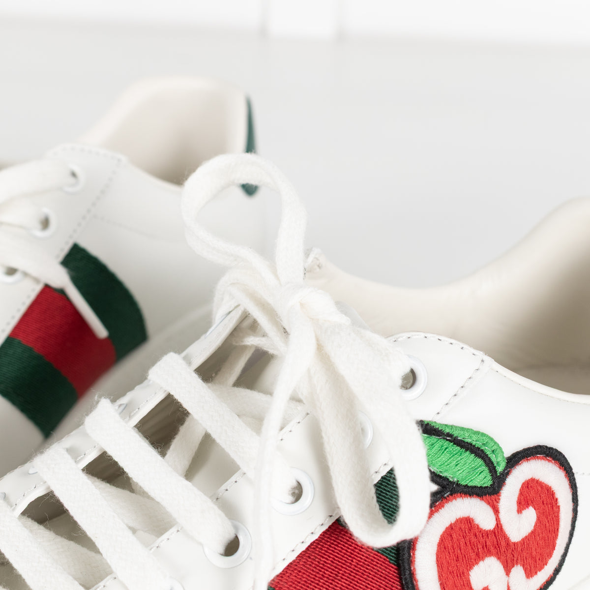 Gucci White Ace Low GG Apple Patch Leather Trainers