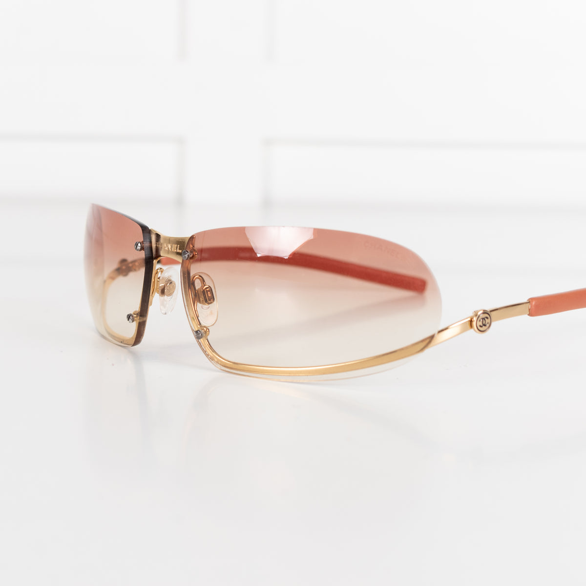 Chanel Orange Tone Frameless Sunglasses