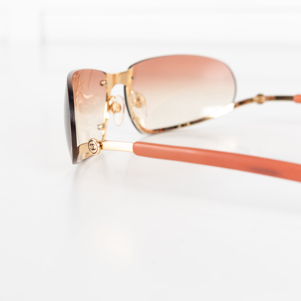 Chanel Orange Tone Frameless Sunglasses
