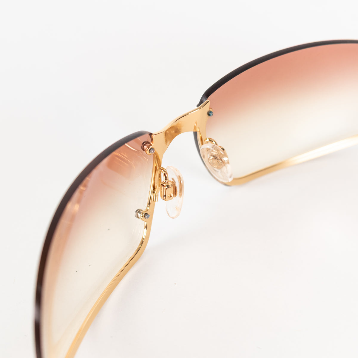 Chanel Orange Tone Frameless Sunglasses