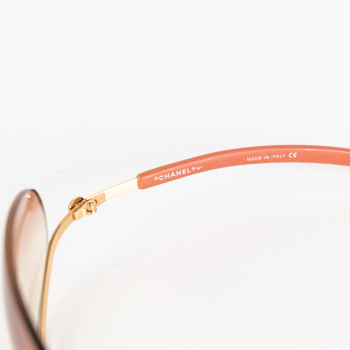 Chanel Orange Tone Frameless Sunglasses
