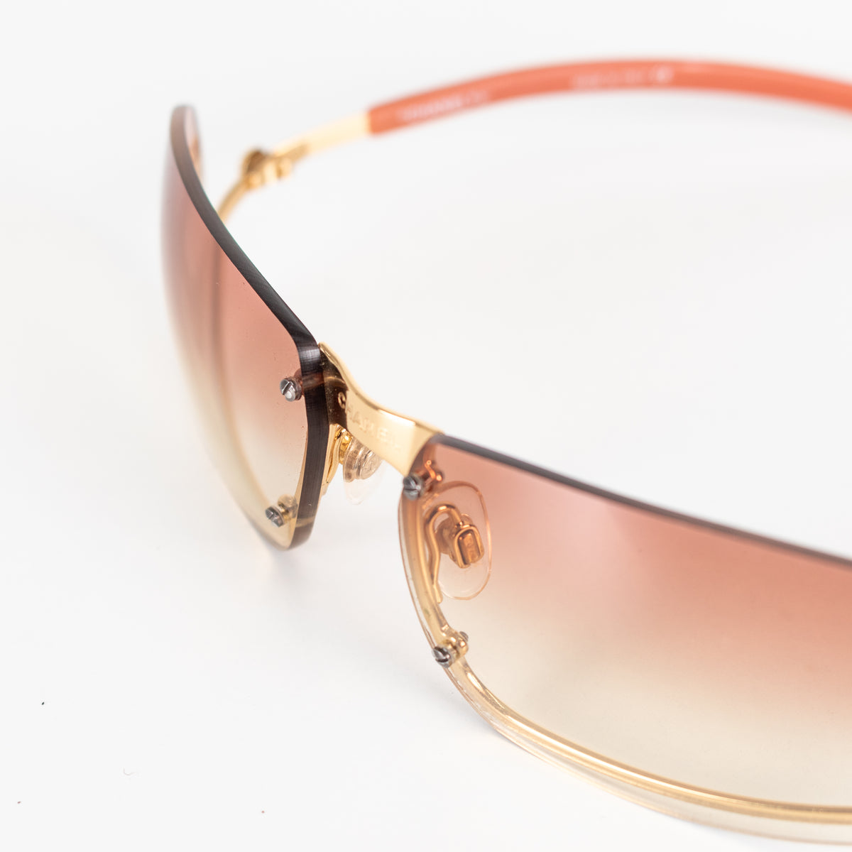 Chanel Orange Tone Frameless Sunglasses