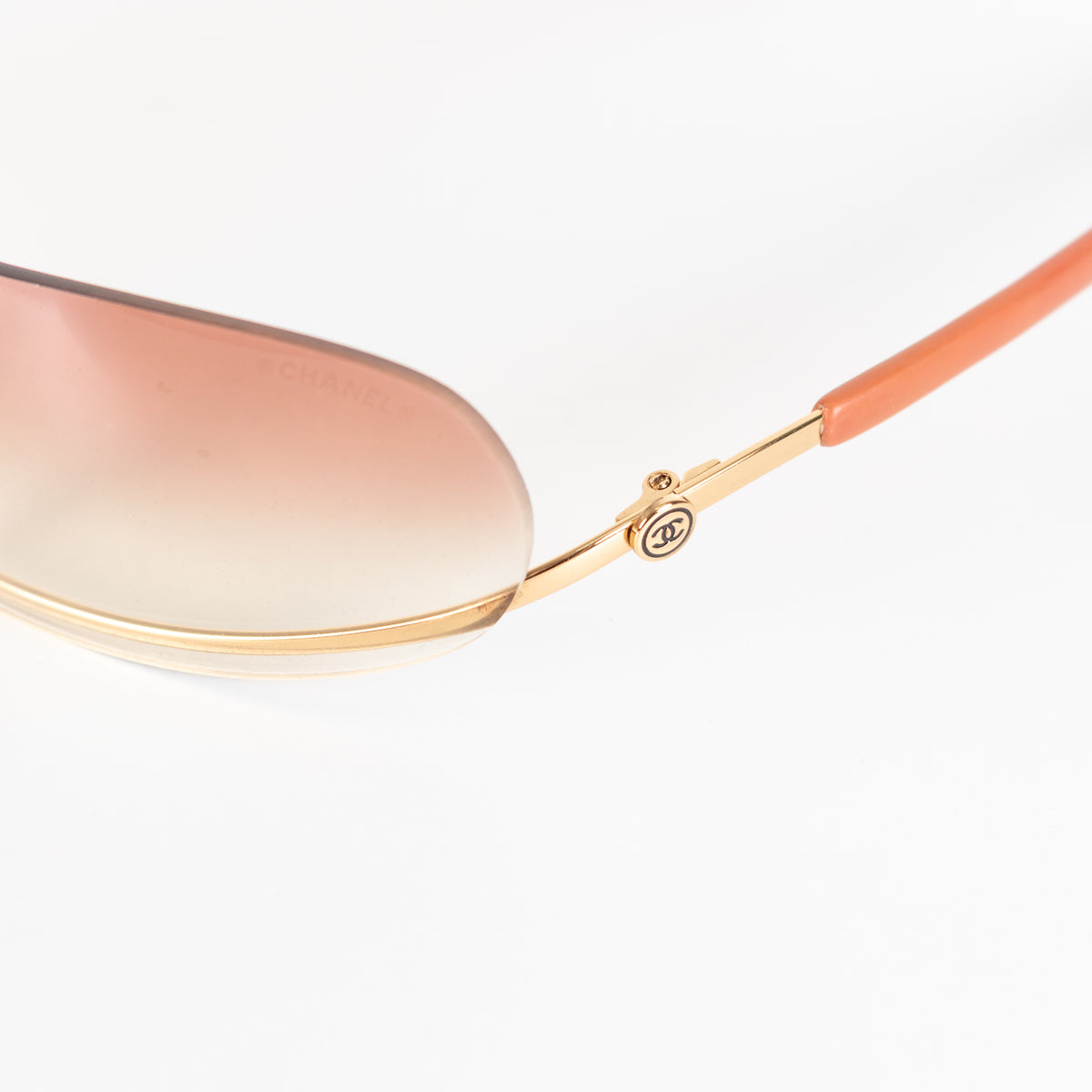 Chanel Orange Tone Frameless Sunglasses