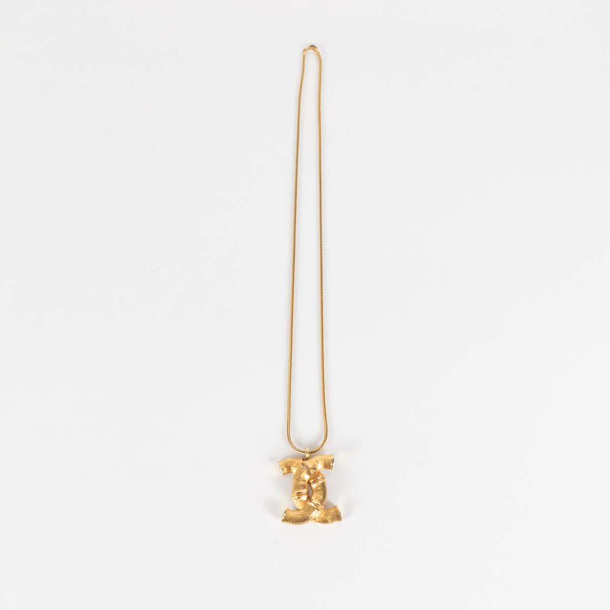 Chanel Gold Tone Coco Mark Bamboo Necklace