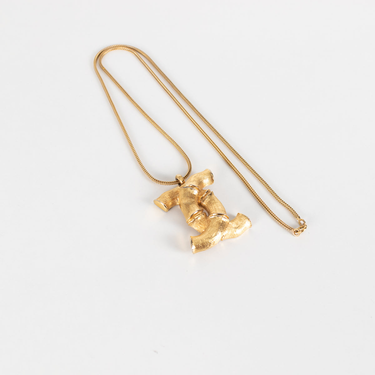 Chanel Gold Tone Coco Mark Bamboo Necklace