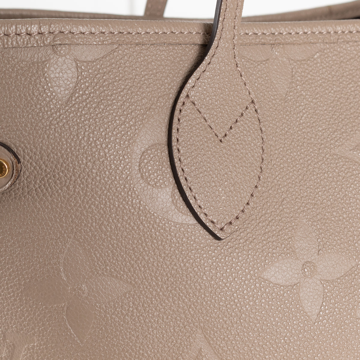 Louis Vuitton Beige Embossed Monogram Neverfull MM bag
